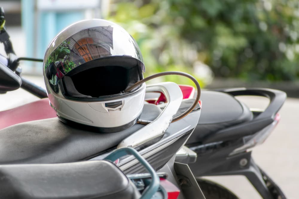helmet resting on motorcycle