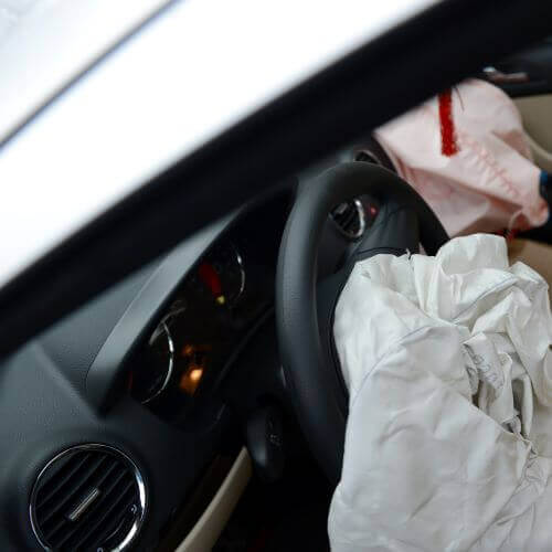 An deployed driver's airbag after a car accident.