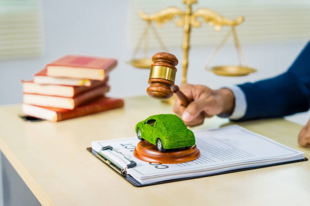 Sustainable Asian lawyer, 2050, in formal suit, tackles contracts with eco-focus.