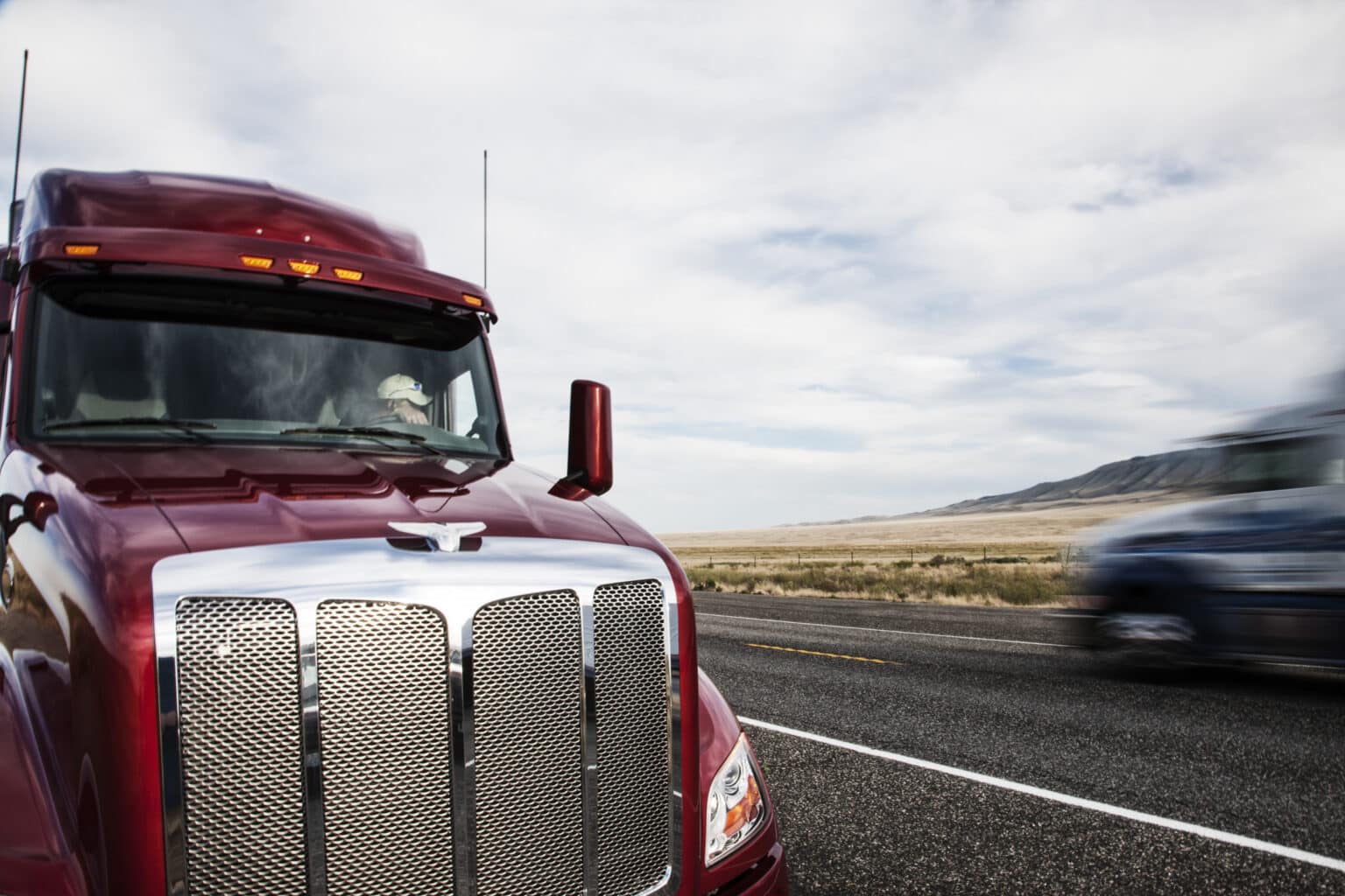 truck driving fast on the highway