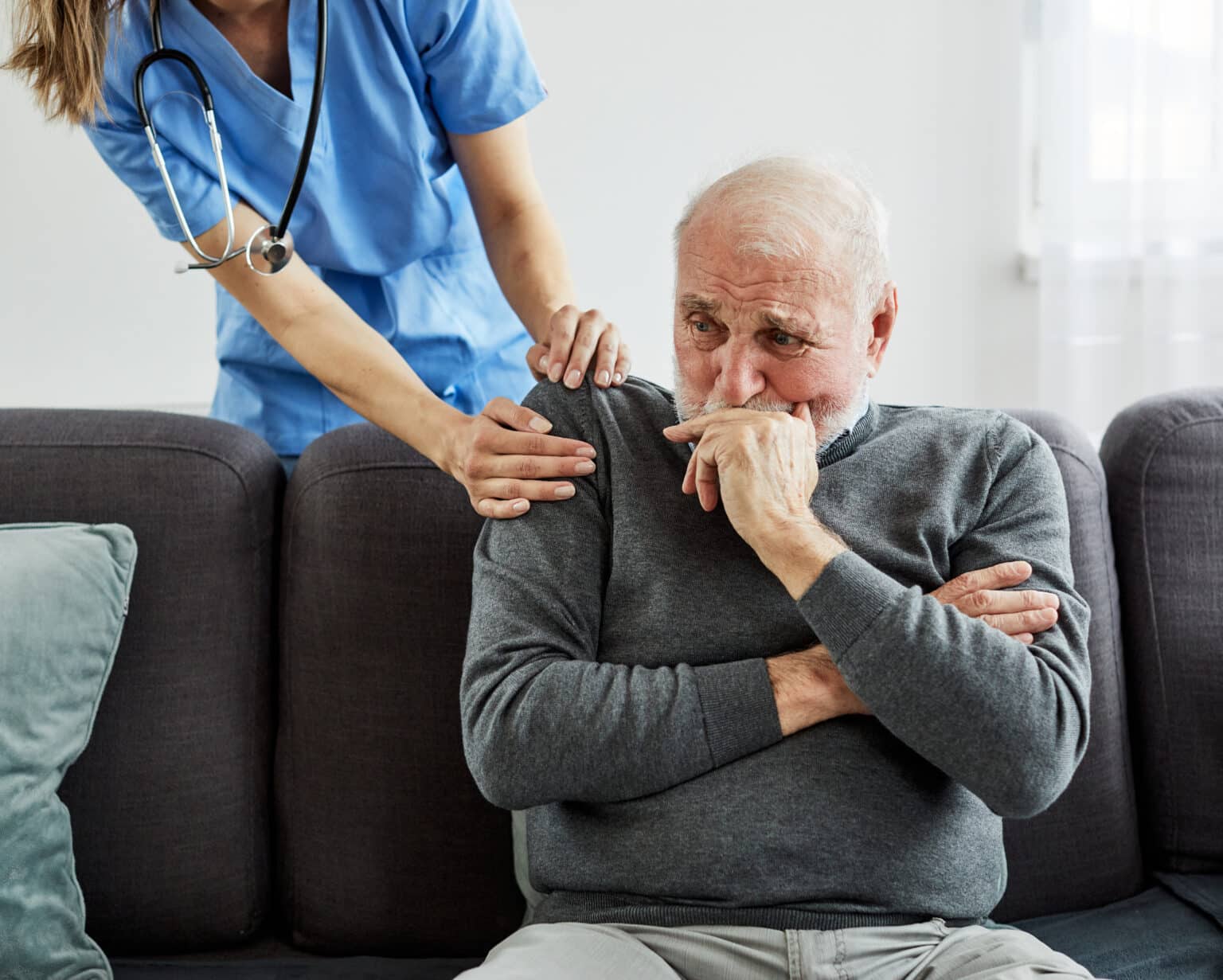nurse and old man in a nursing home