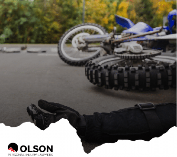 a fallen motorcycle rider and the motorcycle
