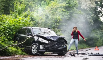 A lady calling for help after an accident