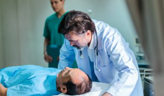 doctor with patient at emergency room