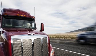 truck driving fast on the highway