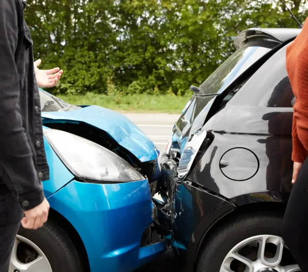 A man and a woman arguing over a rear accident