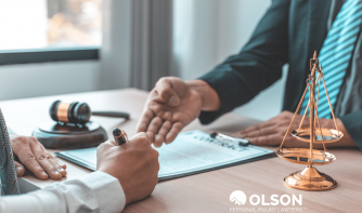 lawyer trying to shake hands with client